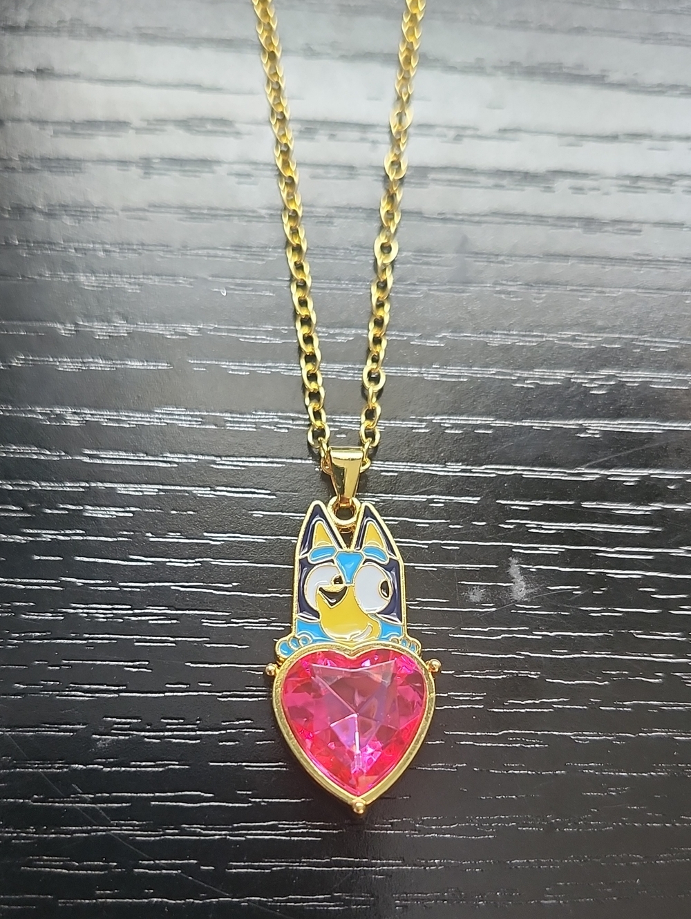Gold Tone Bluey Pendant Necklace with Pink Heart Crystal